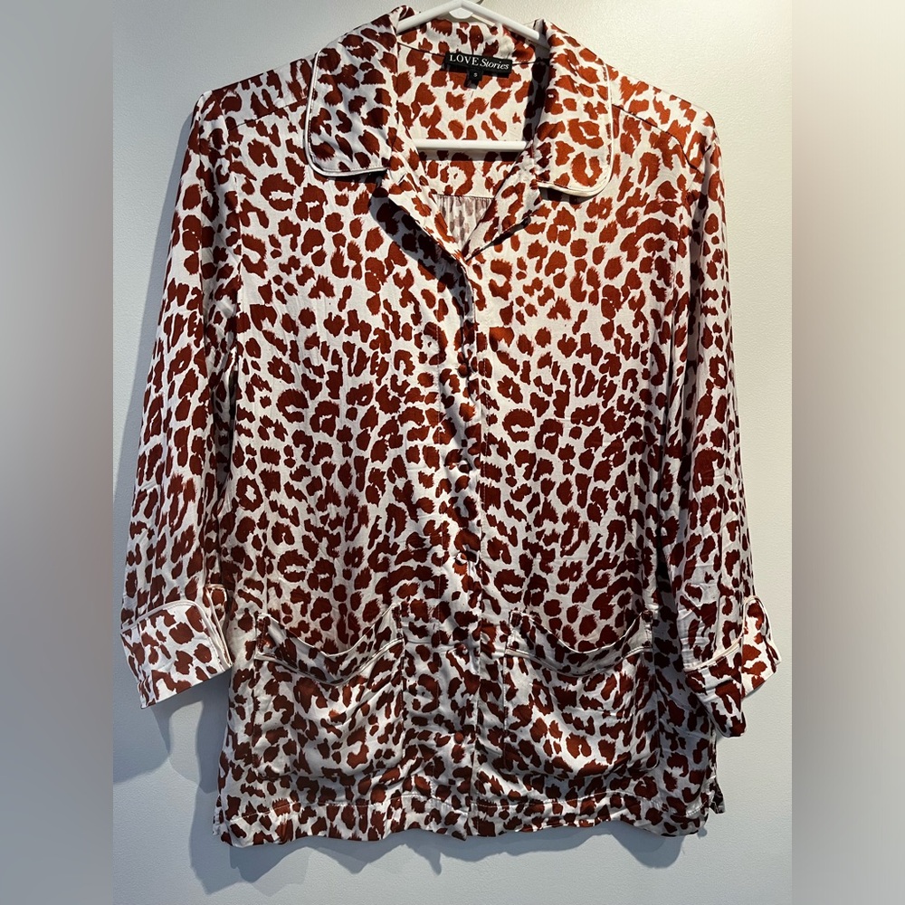 Love Stories animal print blouse with 3/4 length sleeves, size small.